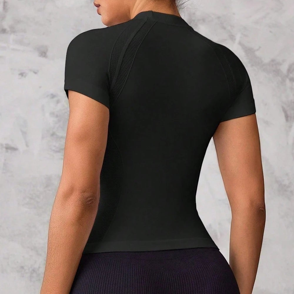 Back view of My Store black seamless short-sleeve sports top with breathable mesh panels for gym and yoga